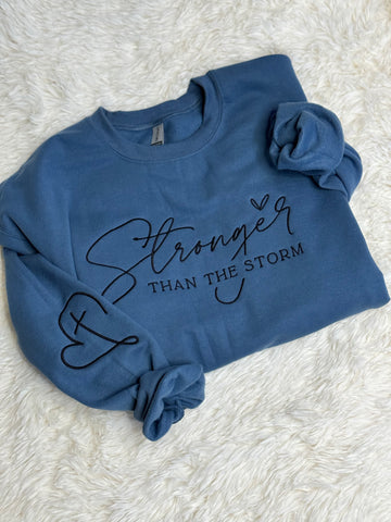 Stronger than the storm large crewneck