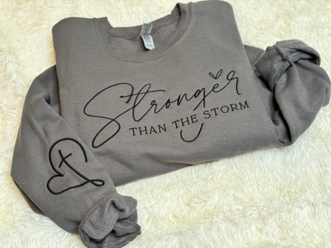 Stronger than the storm Gildan Crewneck